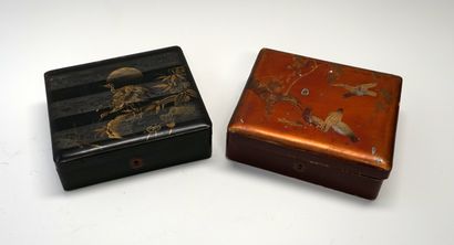 Lacquered boxes, one decorated with cranes...