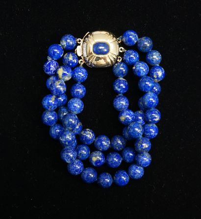 BRACELET composed of 3 rows of lapis lazuli...