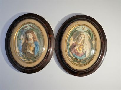 Pair of painted plaster bas-reliefs representing...
