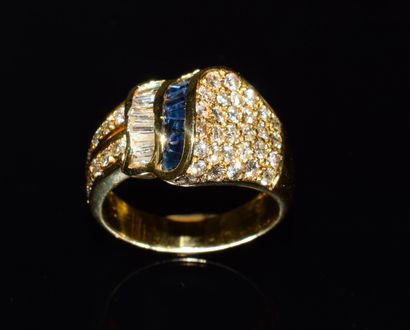 Band ring in 18K gold (750/°°) set with diamonds...