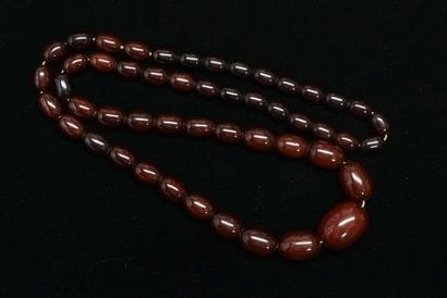 SAUTOIR of oblong beads in fall of color...