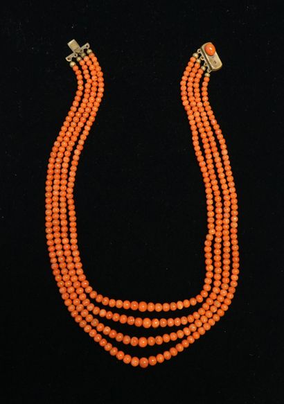 NECKLACE composed of 4 rows of smooth orange-red...