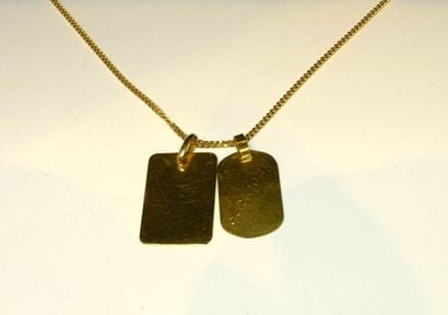 CHAINE en or jaune 18K (750/°°) maille gourmette...