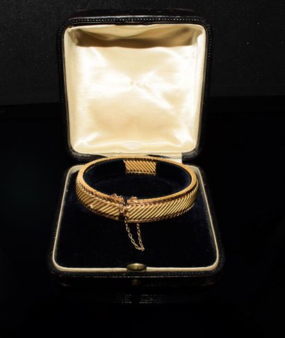 BRACELET en or 18k (750/°°), maille bicolore...