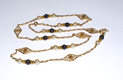 SAUTOIR in 18K yellow gold (750/°°) filigree...