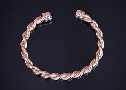 BRACELET rigid open twisted gold plated....