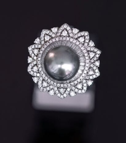 Adjustable ring in silver min 800/°° forming...
