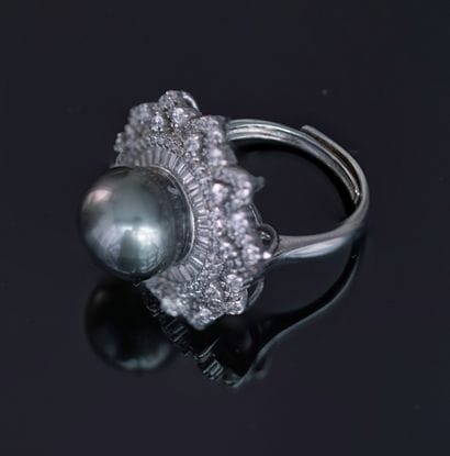 Adjustable ring in silver min 800/°° forming...