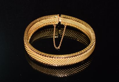 BRACELET en or 18k (750/°°), maille bicolore...