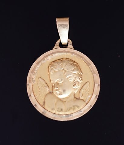 Baptismal medal in 18k yellow gold (750°/°°°)...