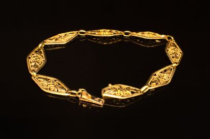BRACELET in 18K gold (750/°°), filigree mesh,...