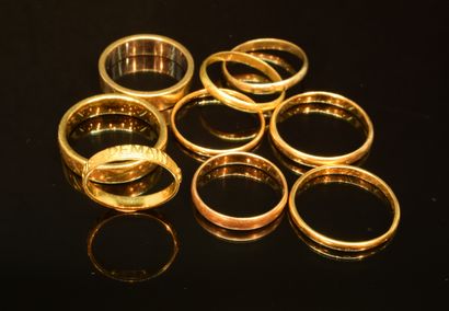 GOLD LOT composed of 9 wedding rings in 18K...