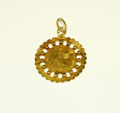 MEDAL of the Virgin in 18K (750/°°) yellow...