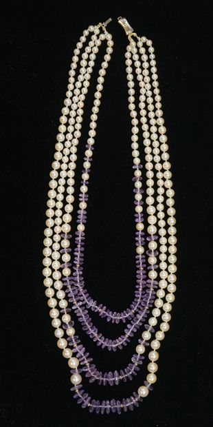 NECKLACE composed of 4 rows of faceted cultured...