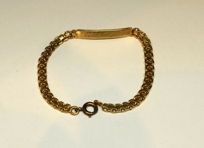 BRACELET en or 18K (750/°°), gourmette enfant,...
