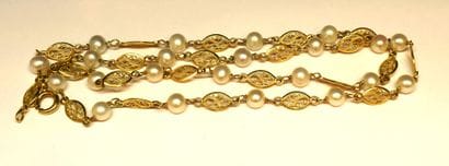 COLLIER en or jaune 18K (750/°°) à maille...