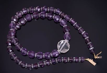 NECKLACE made of faceted amethyst beads interspersed...