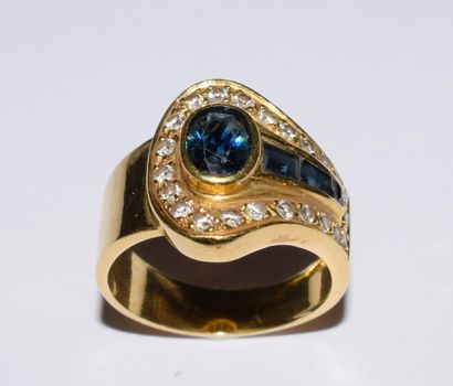 BAGUE vintage en or jaune 18K (750/°°) figurant...