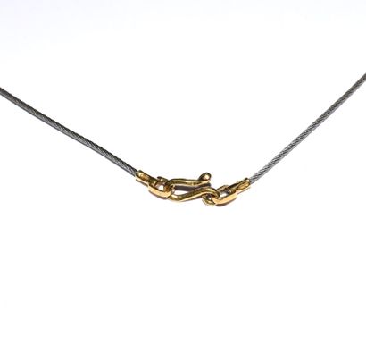 18k (750/°°) yellow gold and steel necklace,...