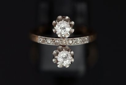 Yellow and 18k (750/°°) white gold ring set...