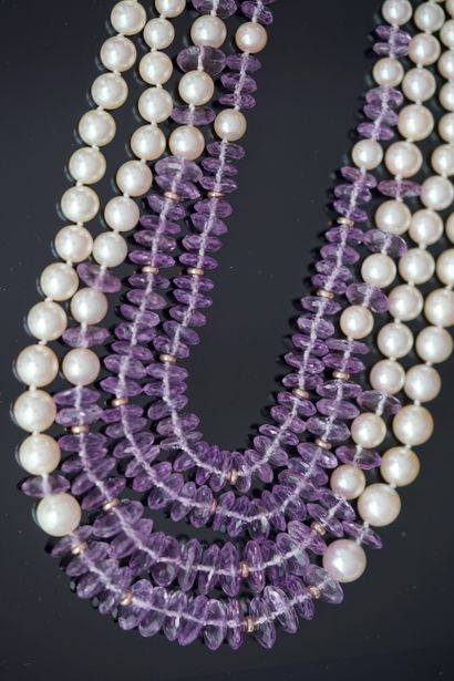 NECKLACE composed of 4 rows of faceted cultured...