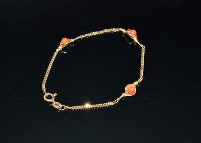 BRACELET en or jaune 18K (750/°°) ponctué...