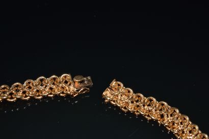 COLLIER en or jaune 18K (750/°°) maille américaine...