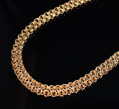 COLLIER en or jaune 18K (750/°°) maille américaine...