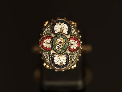 BAGUE en or jaune 18K (750/°°) centrée d'un...