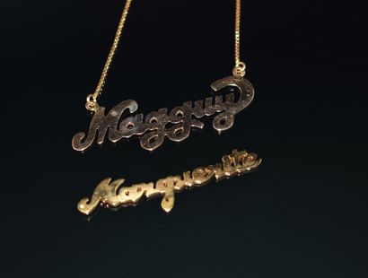 COLLIER en or jaune 18K (750/°°) centré du...