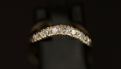 AC BAGUE ligne sinueuse en or jaune ponctuée...