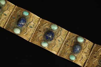 BRACELET large à plaques articulées en argent...