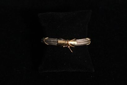 BRACELET JONC ouvrant formé de câbles d'argent...