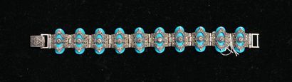 BRACELET articulé composé d'éléments ovales...