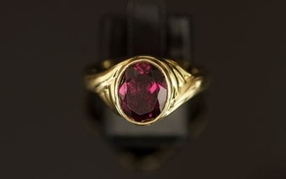 BAGUE en argent doré (vermeil) 925/°° centrée...
