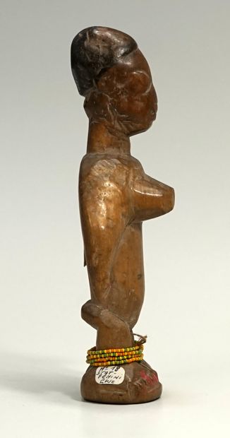 Petit fétiche féminin représentant une femme...
