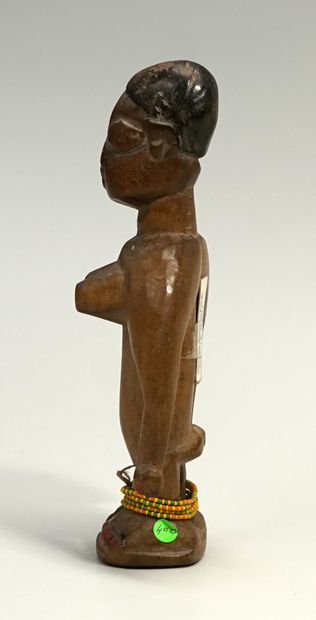 Petit fétiche féminin représentant une femme...
