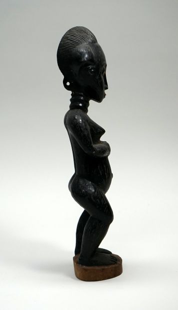 Colon Baoule représentant une jeune fille...