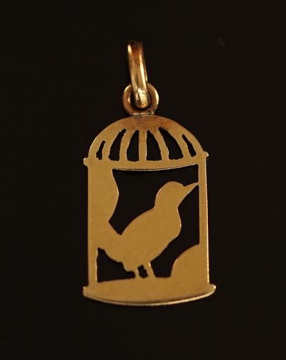 Yellow gold and enamel pendant featuring...