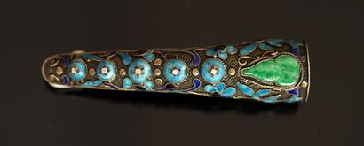 Claw-shaped silver brooch with blue enameled...