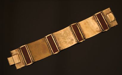BRACELET LARGE articulé en métal doré à plaques...
