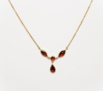 NECKLACE in 18k (750°°) yellow gold, centered...