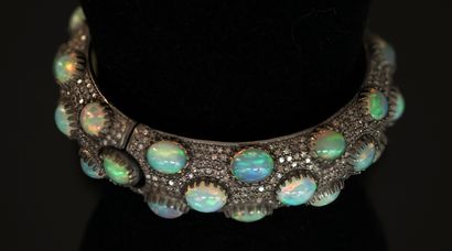 BRACELET in low-titanium patinated silver...