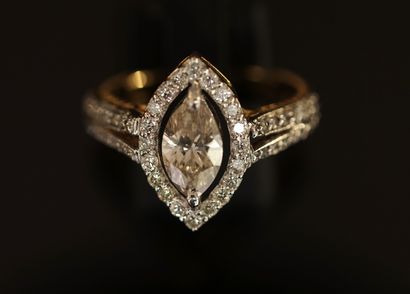 Yellow gold and white gold ring centered...