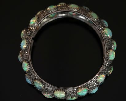 BRACELET in low-titanium patinated silver...