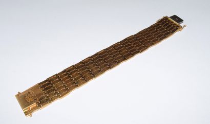 18K (750/°°) yellow gold BELT BRACELET, numbered...