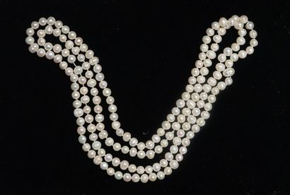 SAUTOIR de grosses perles cerclées d'eau...