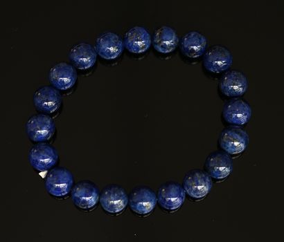 BRACELET de perles rondes de lapis lazuli...