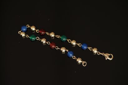 BRACELET en plaqué or orné de boules de cornaline...