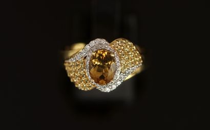 BAGUE en argent doré 925/°° centrée d'un...